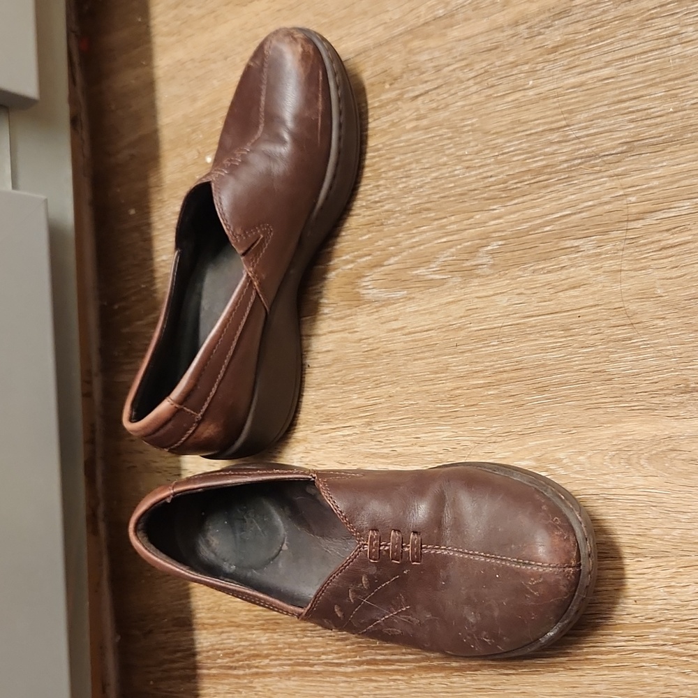brown leather clogs